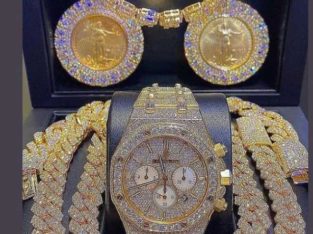 gold necklace and wristwatch