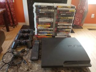 Sony PlayStation PS3 system with alot of games and controllers 