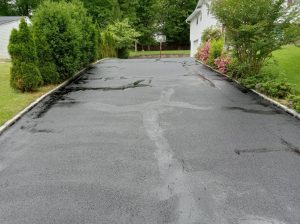 Rocky’s driveway sealcoating and pothole repair
